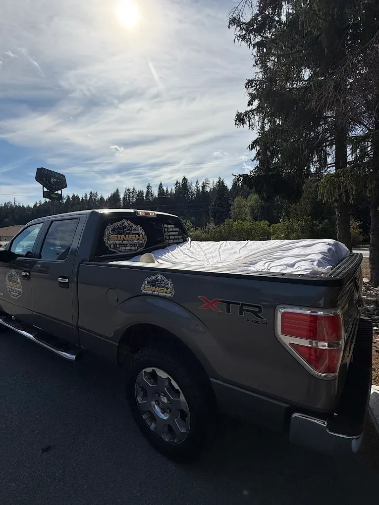 Singh Moving & Dumping pickup truck