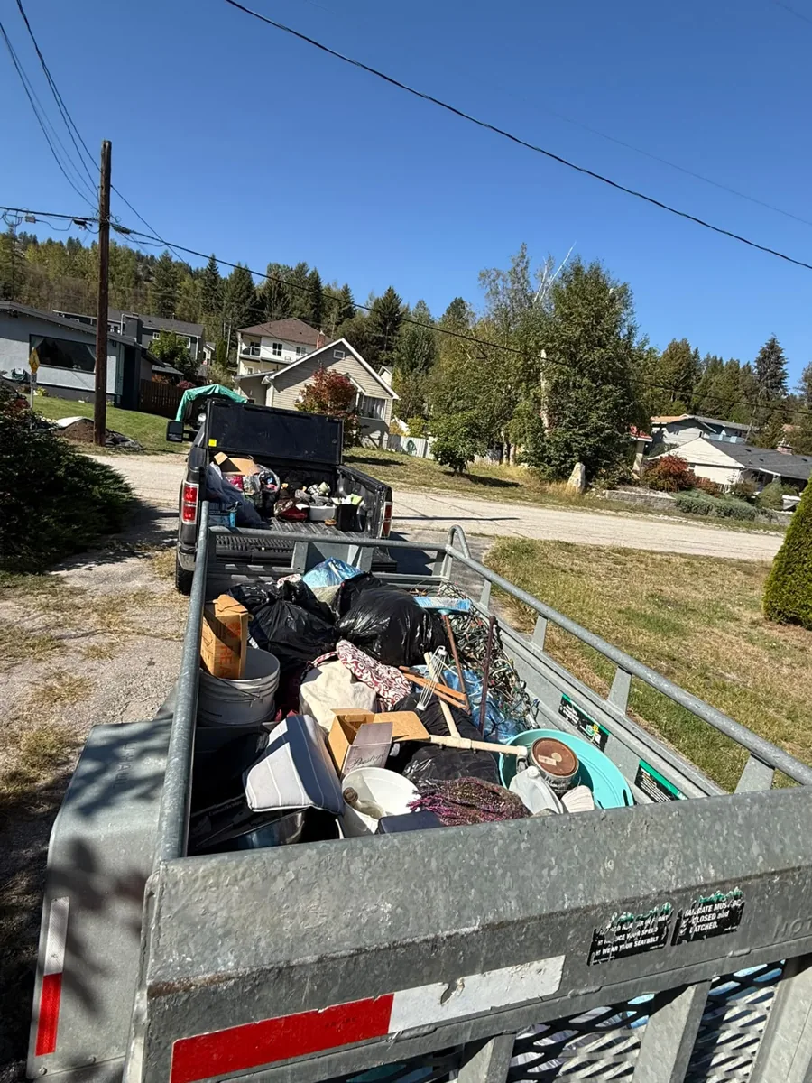 Household items loaded in a trailer for a dump run
