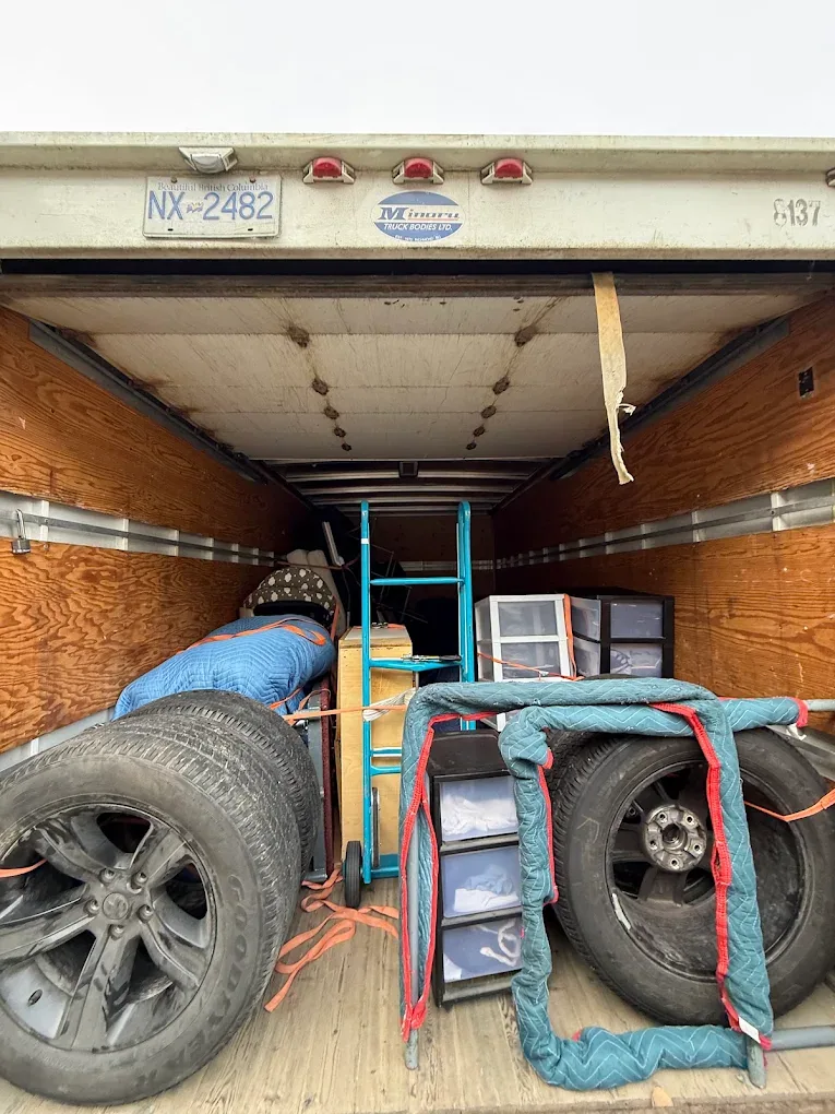 Moving blankets, straps and equipment inside the moving truck.
